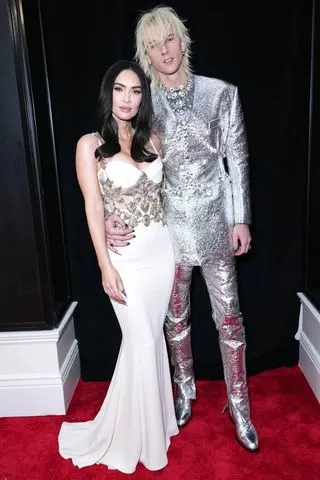 Kevin Mazur/Getty (L-R) Megan Fox and Machine Gun Kelly attend the 65th GRAMMY Awards
