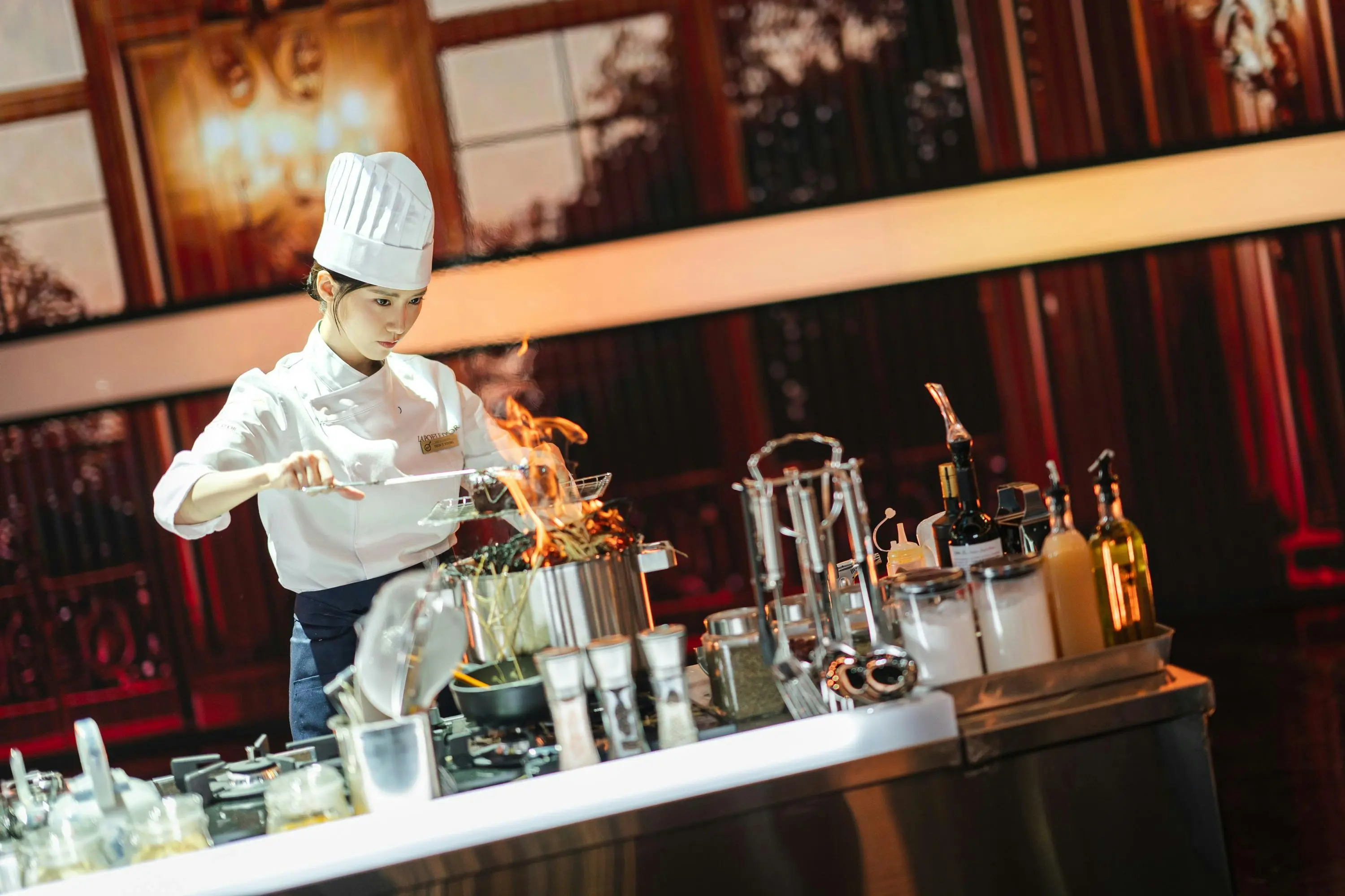 Still from The Tyrant's Chef showing YoonA cooking