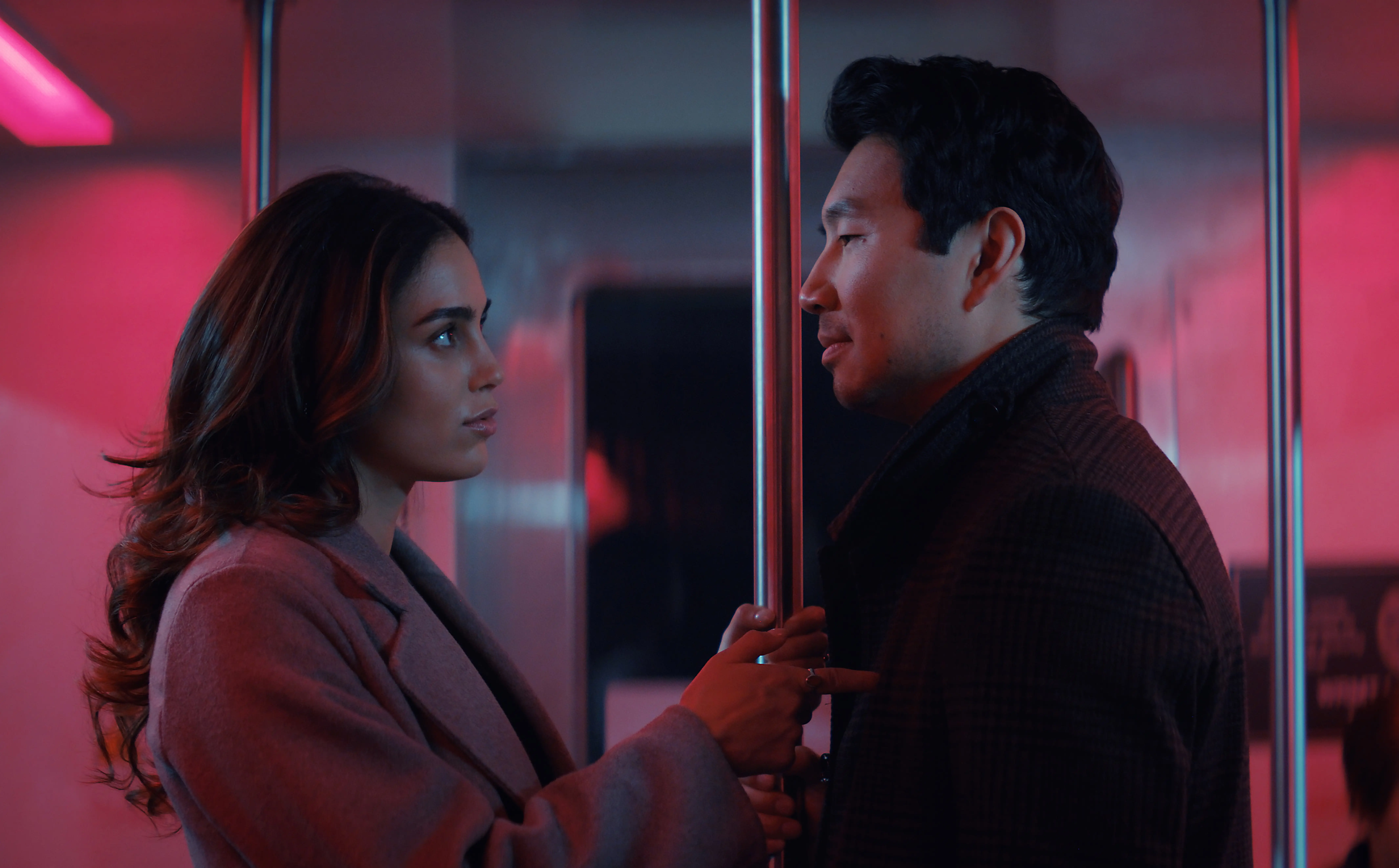THE COPENHAGEN TEST -- Episode 101 -- Pictured: (l-r) Melissa Barrera as Michelle, Simu Liu as Alexander-- (Photo by: PEACOCK)