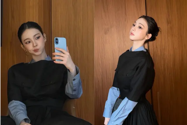 Karina身穿黑色吊带裙叠穿蓝色衬衫,展现出知性优雅的时尚魅力,眼神坚定自信