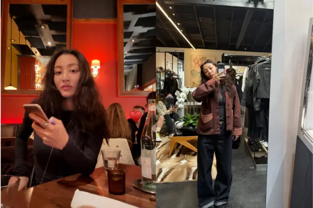 志效在服装店内身穿休闲夹克和阔腿裤,倚靠在柜台前展现随性时尚感